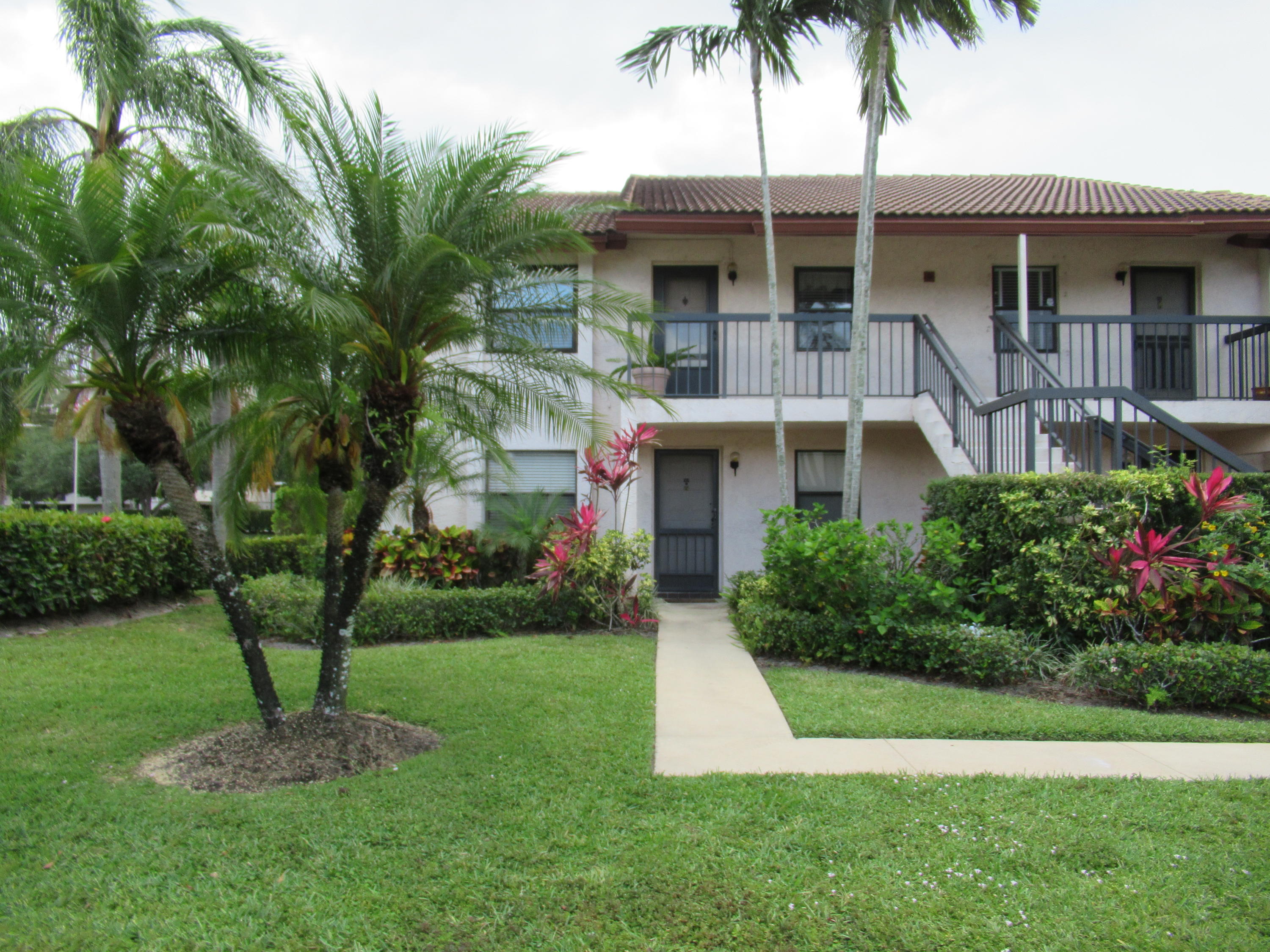 22160 Palms Way, Unit 201 Boca Raton, FL 33433 - Photo 1 of 17 FRONT