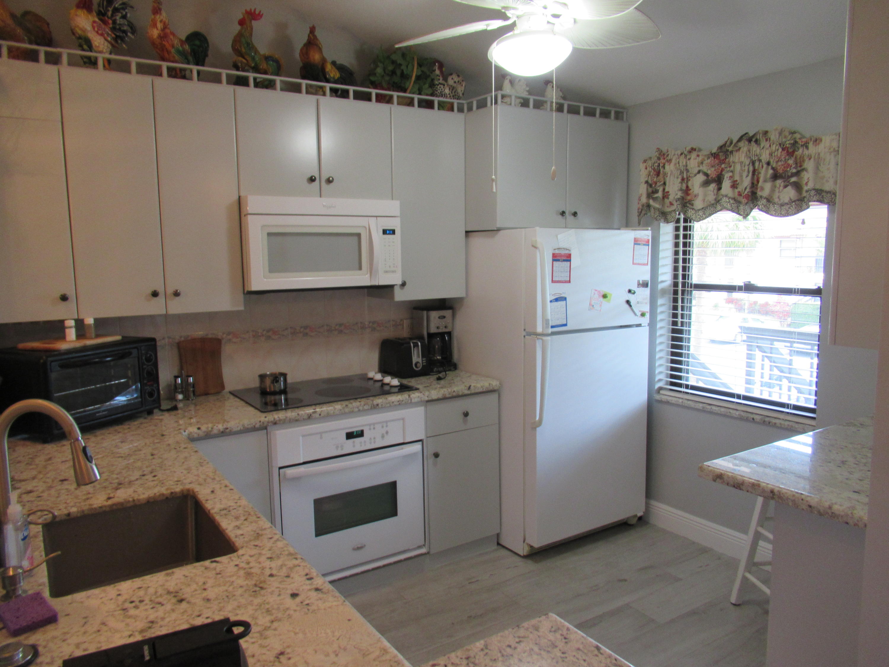 22160 Palms Way, Unit 201 Boca Raton, FL 33433 - Photo 2 of 17 IMG_1930
