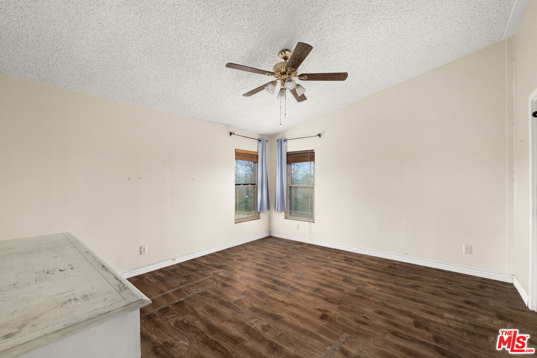 6425 Smoke Tree Road Phelan, CA 92371 - Photo 12 of 35 a view of a kitchen with a sink and dishwasher