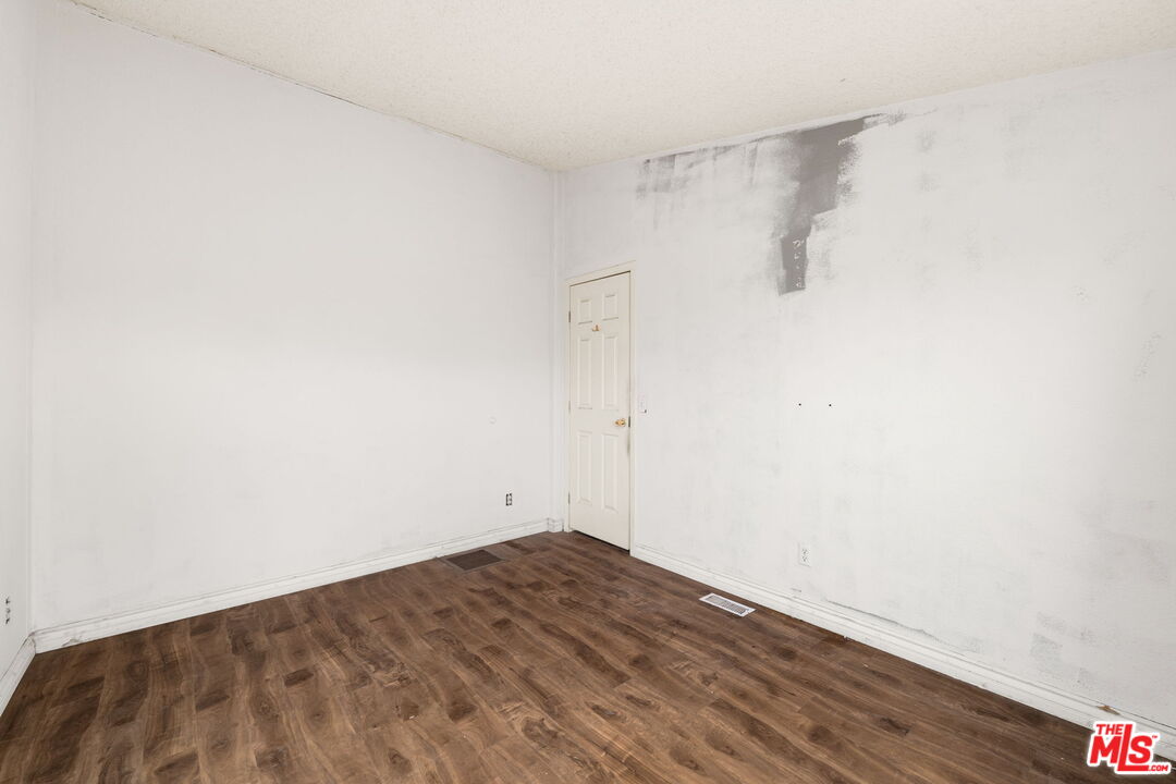 6425 Smoke Tree Road Phelan, CA 92371 - Photo 15 of 35 a view of a room with wooden floor