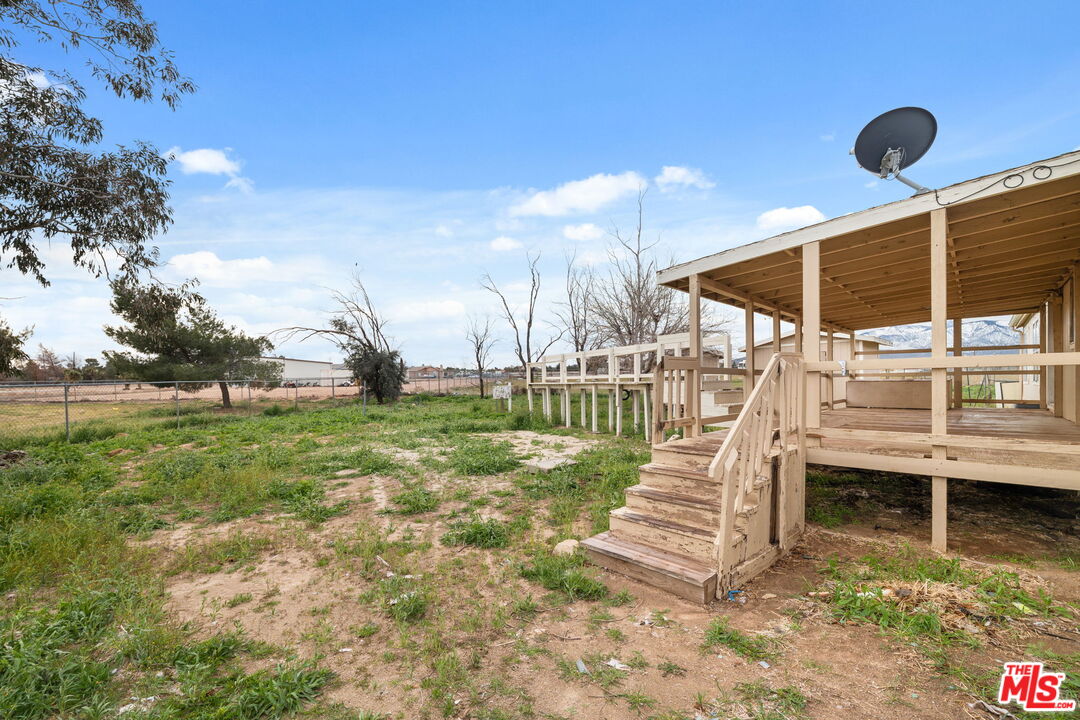 6425 Smoke Tree Road Phelan, CA 92371 - Photo 26 of 35 a view of a backyard with a ocean view