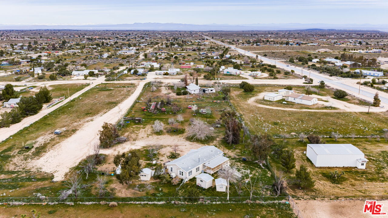 6425 Smoke Tree Road Phelan, CA 92371 - Photo 32 of 35 an aerial view of residential houses with outdoor space
