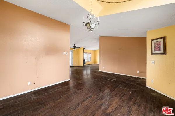 a view of livingroom with hardwood floor and hallway