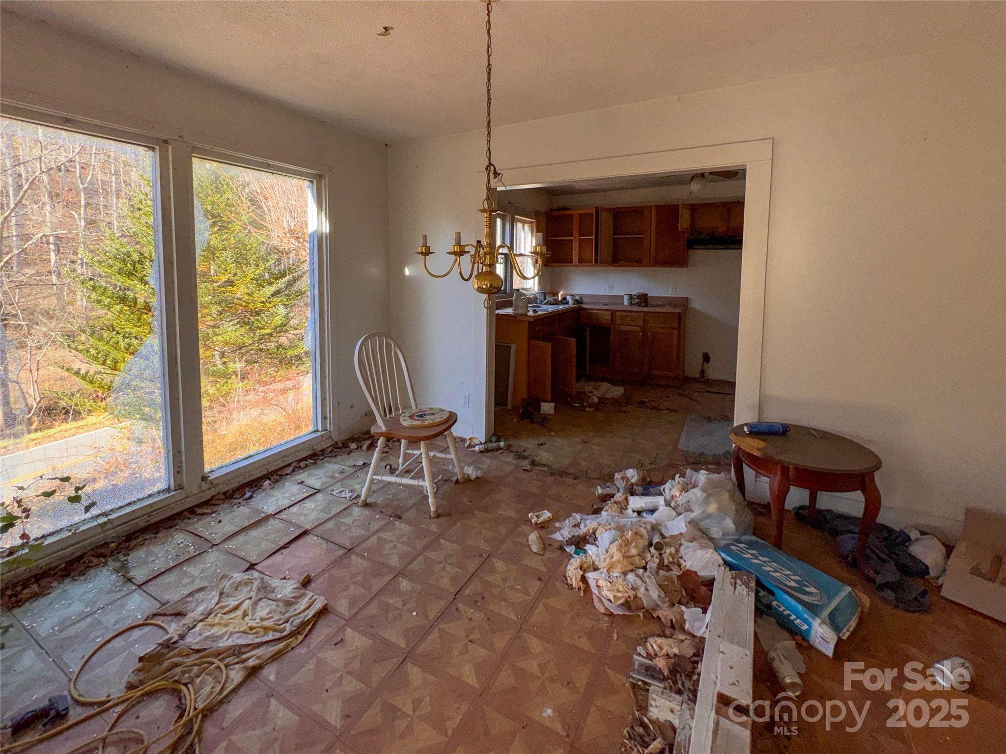 218 Cub Creek Road Bakersville, NC 28705 - Photo 11 of 20 a living room with furniture and a window