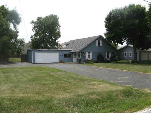 2073 Sheffer Road Aurora, IL 60502 - Photo 1 of 1 a front view of house with yard and trees