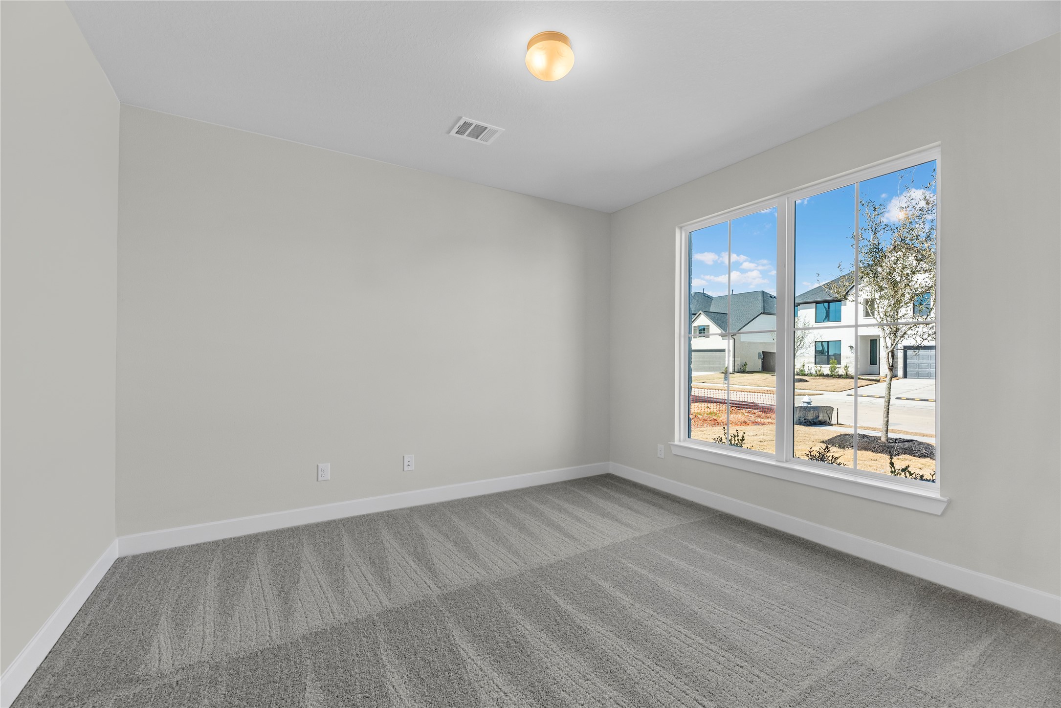 5023 Nesbit Path Rosenberg, TX 77471 - Photo 14 of 25 a view of an empty room with a window