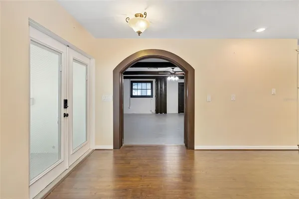 a view of a livingroom with wooden floor