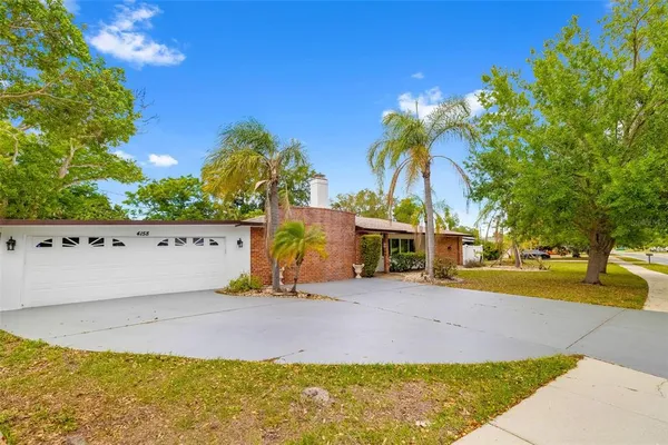 a front view of a house with yard
