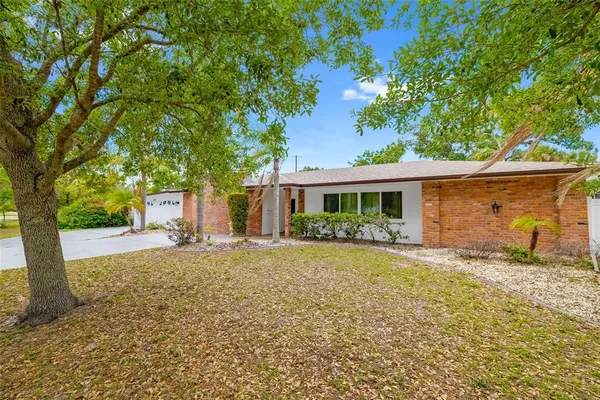 a view of a house with swimming pool