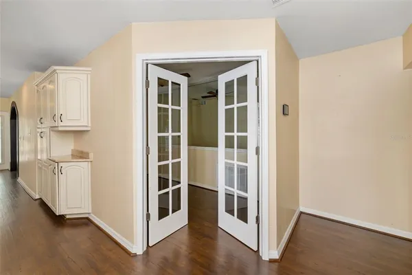 a view of an empty room with a window