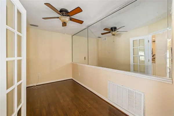 a view of an empty room with a window