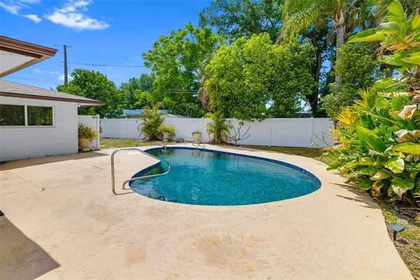 a view of backyard of house
