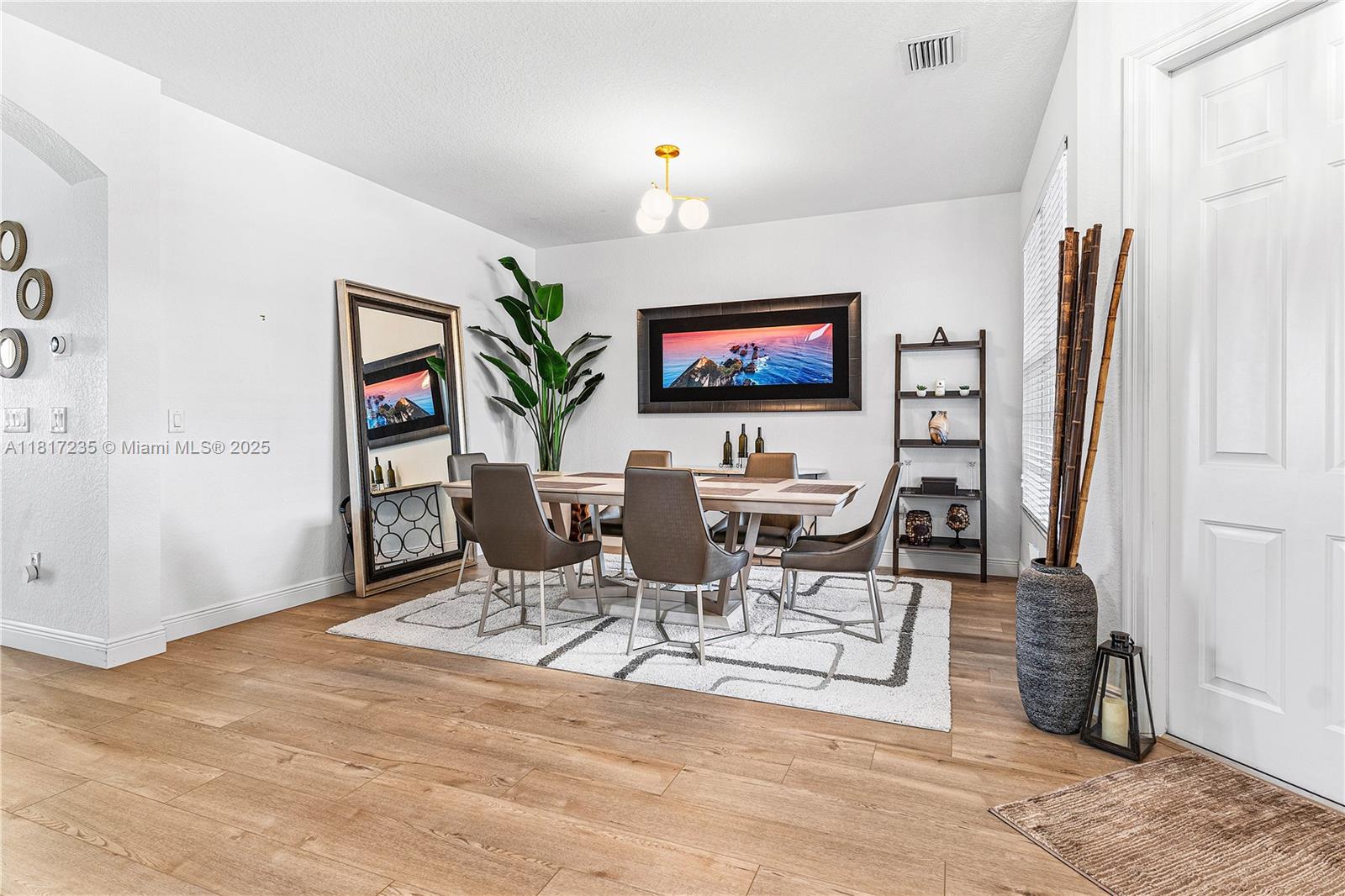 4356 Southwest 179th Way Miramar, FL 33029 - Photo 13 of 65 a view of a livingroom with furniture and a flat screen tv