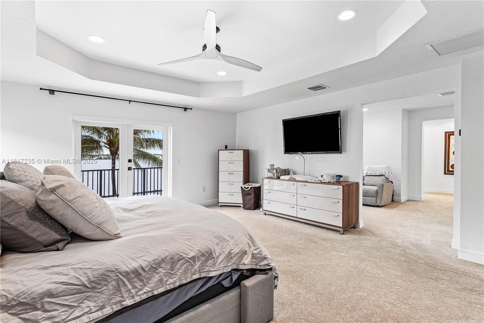 4356 Southwest 179th Way Miramar, FL 33029 - Photo 26 of 65 a bedroom with a bed and a flat screen tv