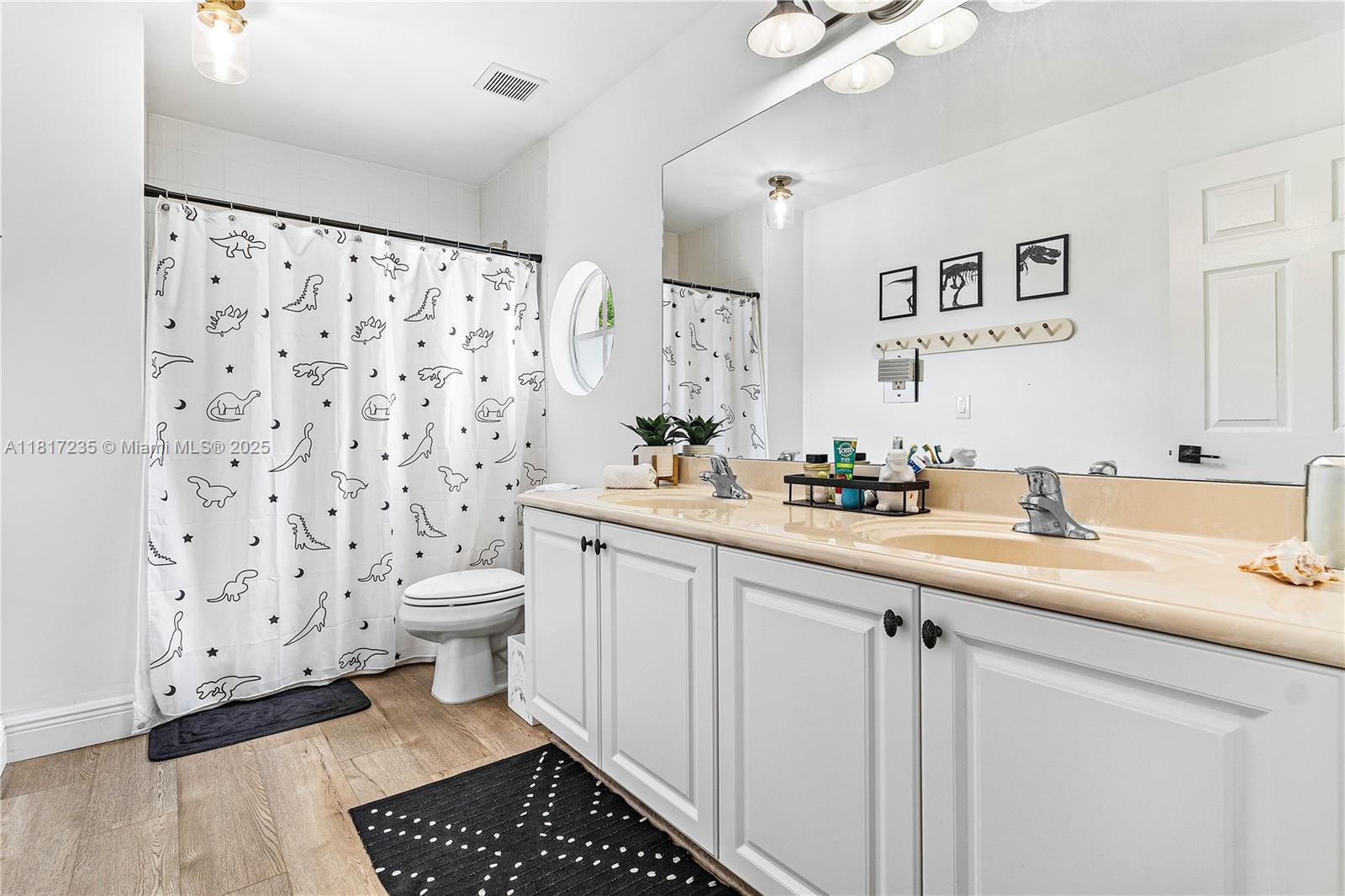 4356 Southwest 179th Way Miramar, FL 33029 - Photo 33 of 65 a spacious bathroom with a sink toilet and shower