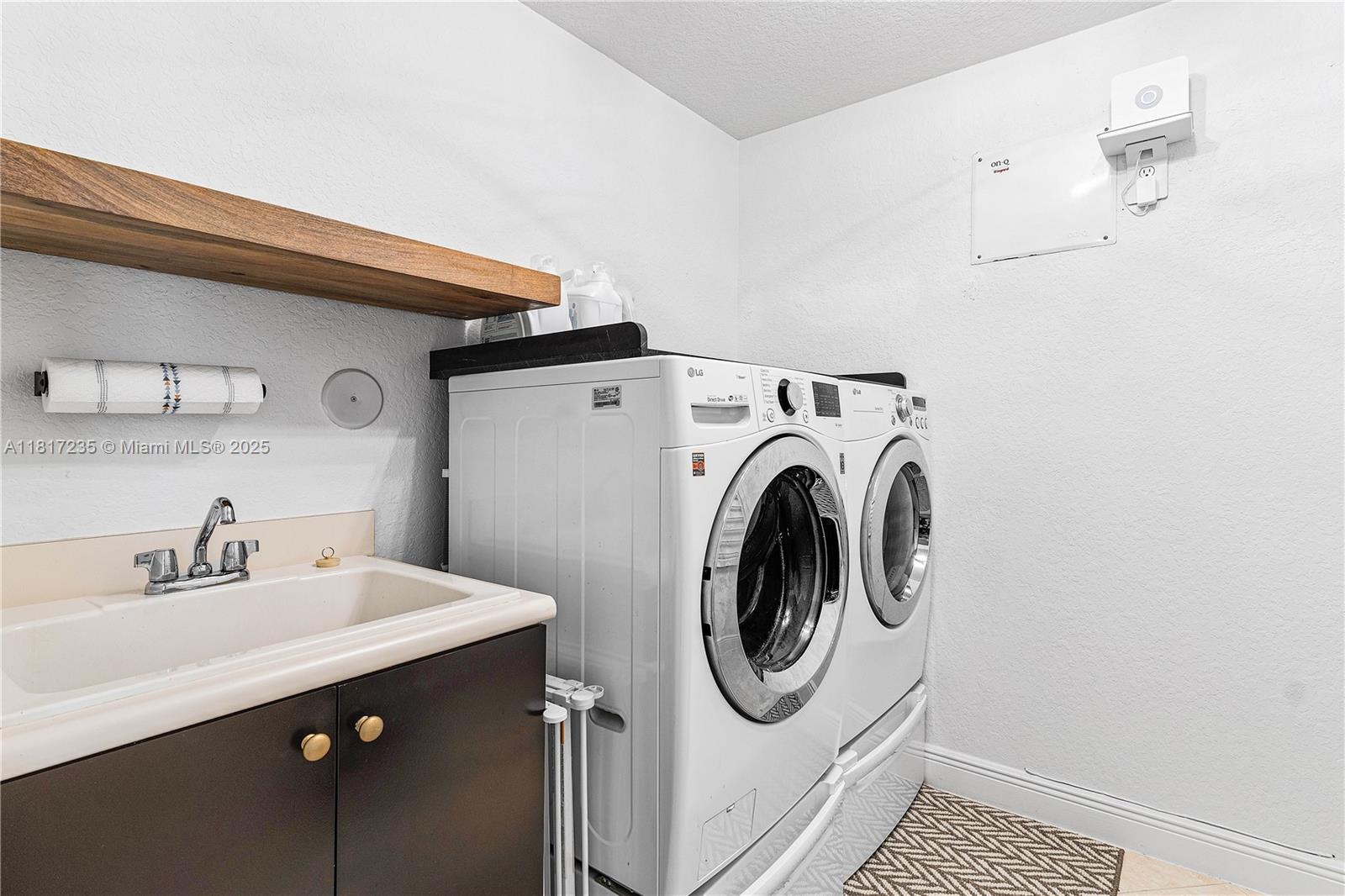 4356 Southwest 179th Way Miramar, FL 33029 - Photo 34 of 65 a utility room with dryer and washer
