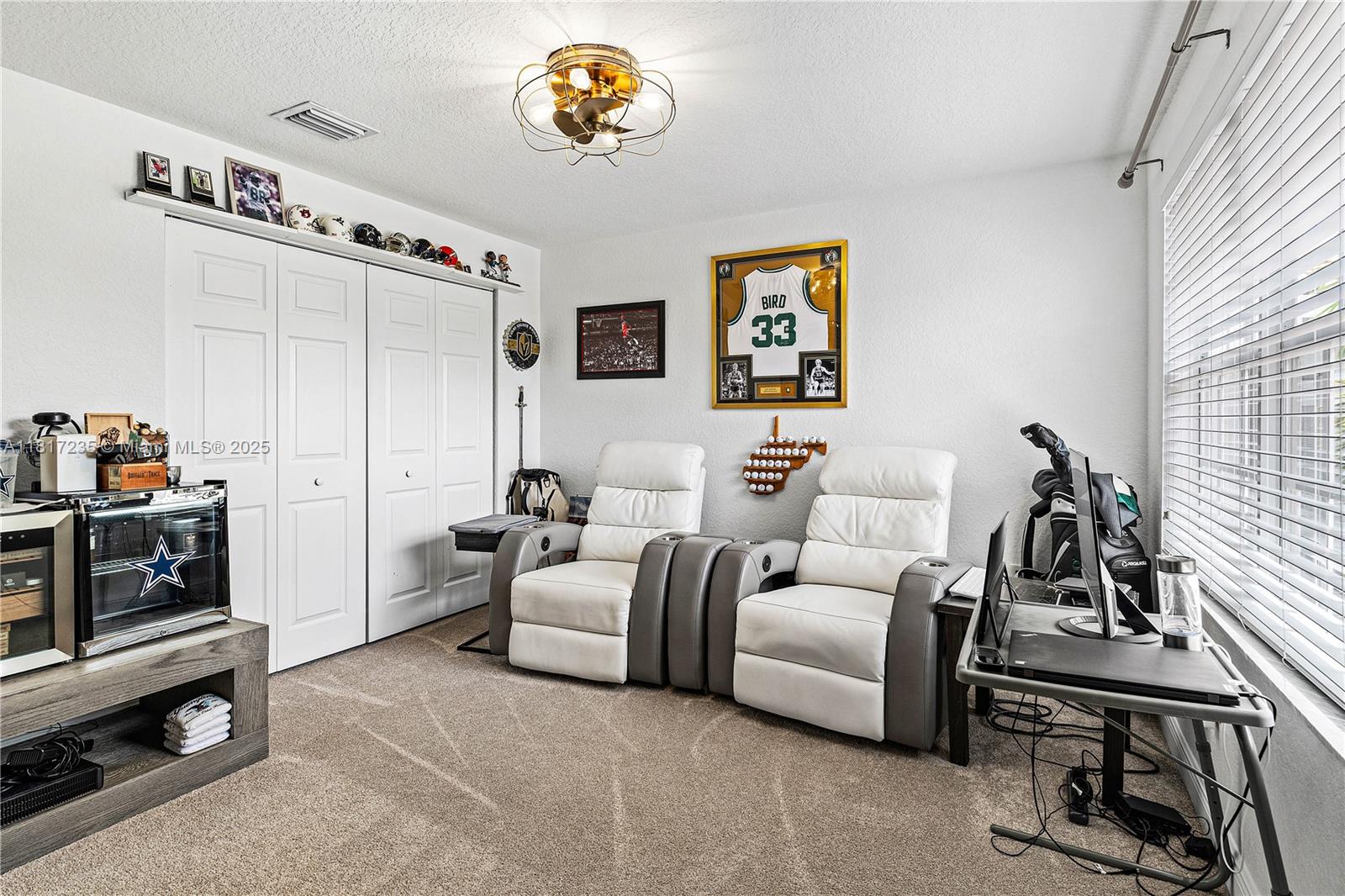 4356 Southwest 179th Way Miramar, FL 33029 - Photo 35 of 65 a living room with furniture and a flat screen tv