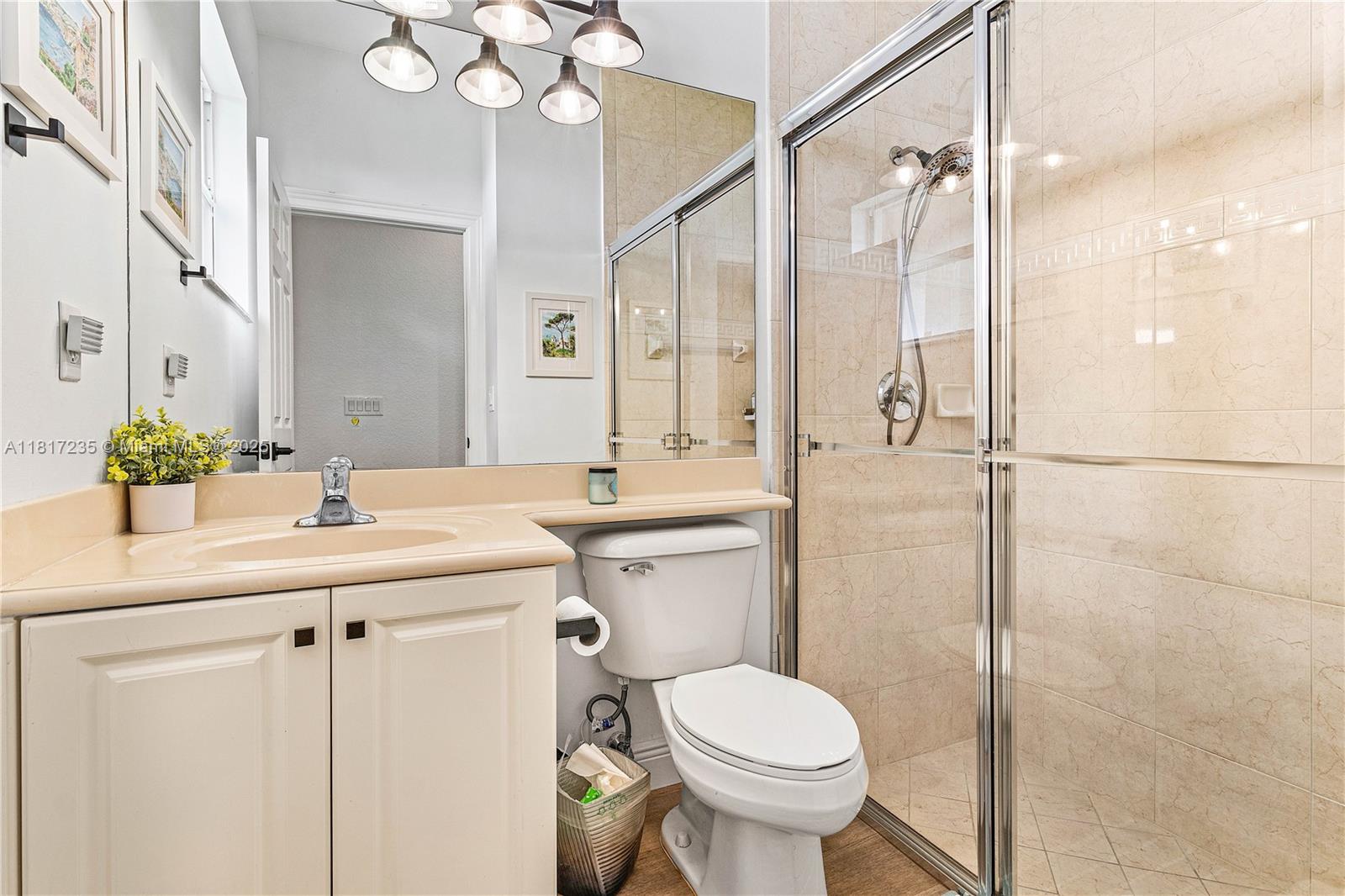 4356 Southwest 179th Way Miramar, FL 33029 - Photo 38 of 65 a bathroom with a sink toilet and shower