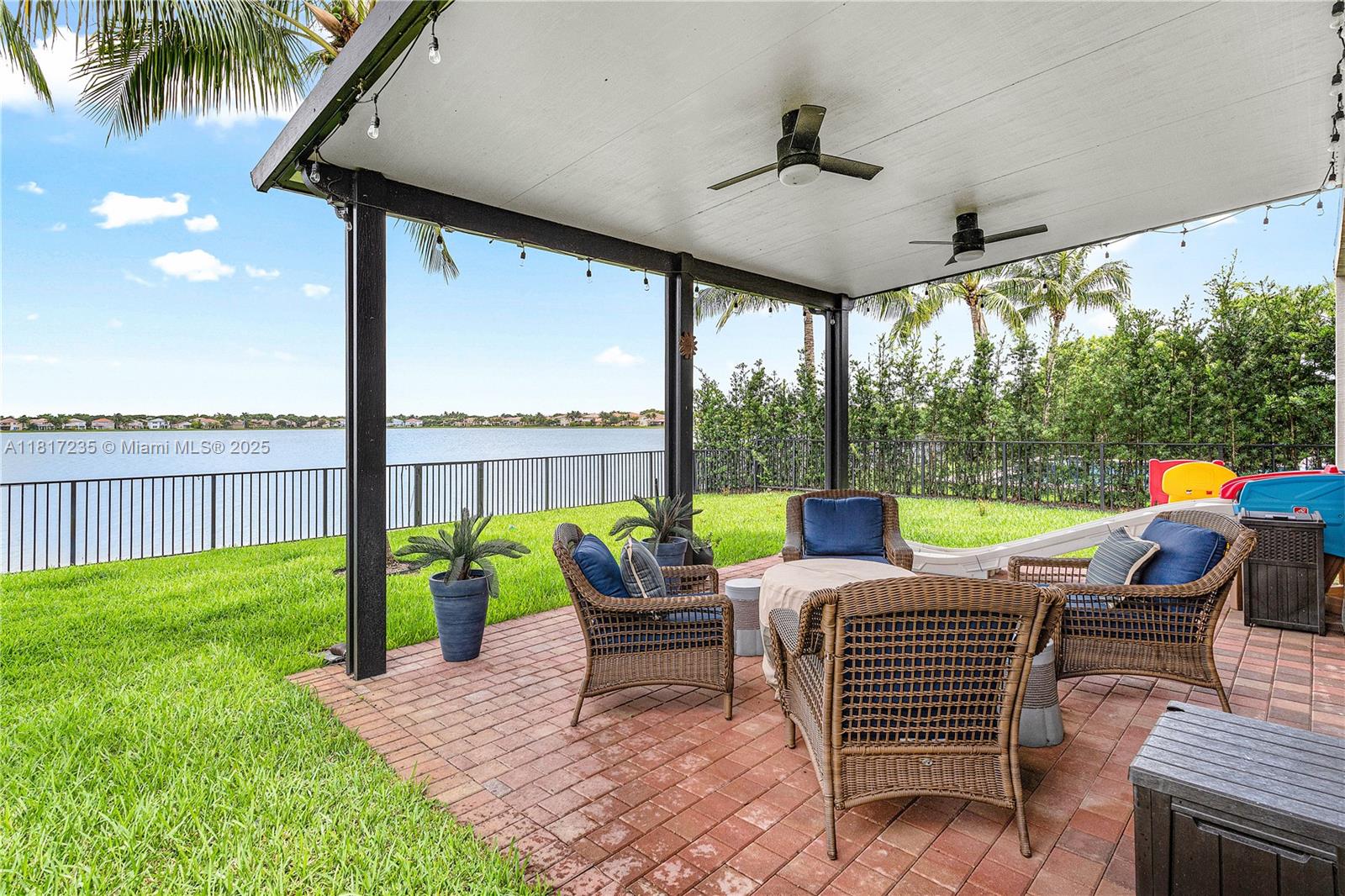 4356 Southwest 179th Way Miramar, FL 33029 - Photo 40 of 65 a balcony with furniture and garden view