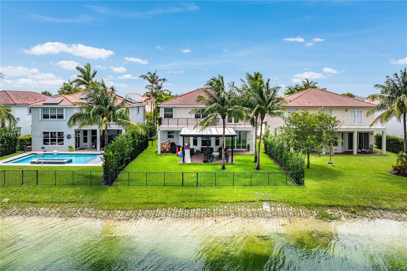 4356 Southwest 179th Way Miramar, FL 33029 - Photo 56 of 65 a view of a house with a swimming pool