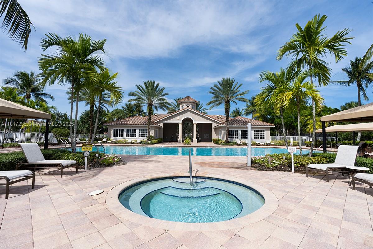 4356 Southwest 179th Way Miramar, FL 33029 - Photo 62 of 65 a view of a house with swimming pool and sitting area