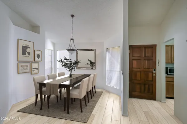 a view of a dining room with furniture