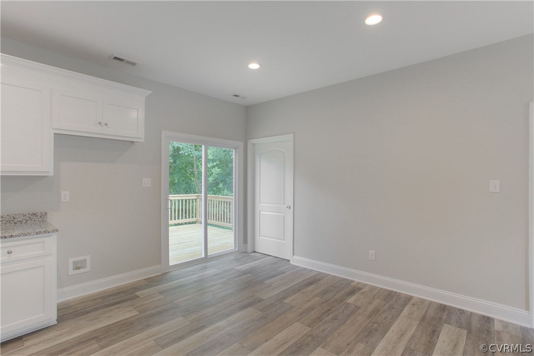 3503 Sylvania Road Chester, VA 23831 - Photo 8 of 26 a view of a livingroom with wooden floor and window
