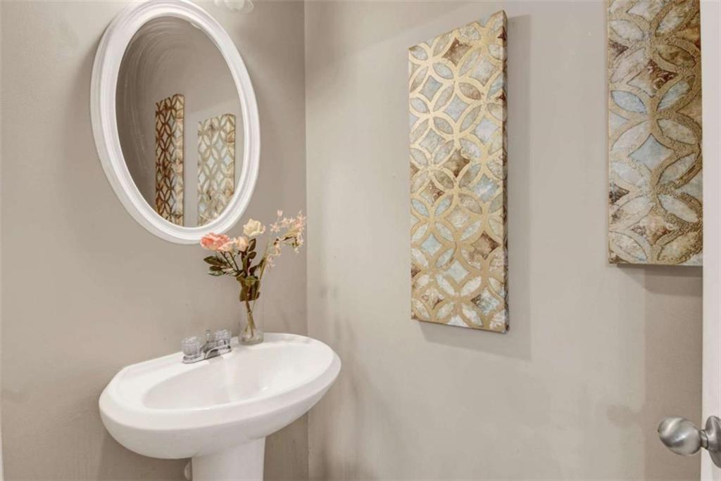 2555 Flat Shoals Road South Fulton, GA 30349 - Photo 12 of 20 a bathroom with a sink and a mirror