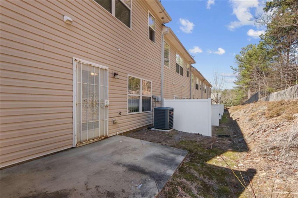 2555 Flat Shoals Road South Fulton, GA 30349 - Photo 20 of 20 a view of a house with a yard
