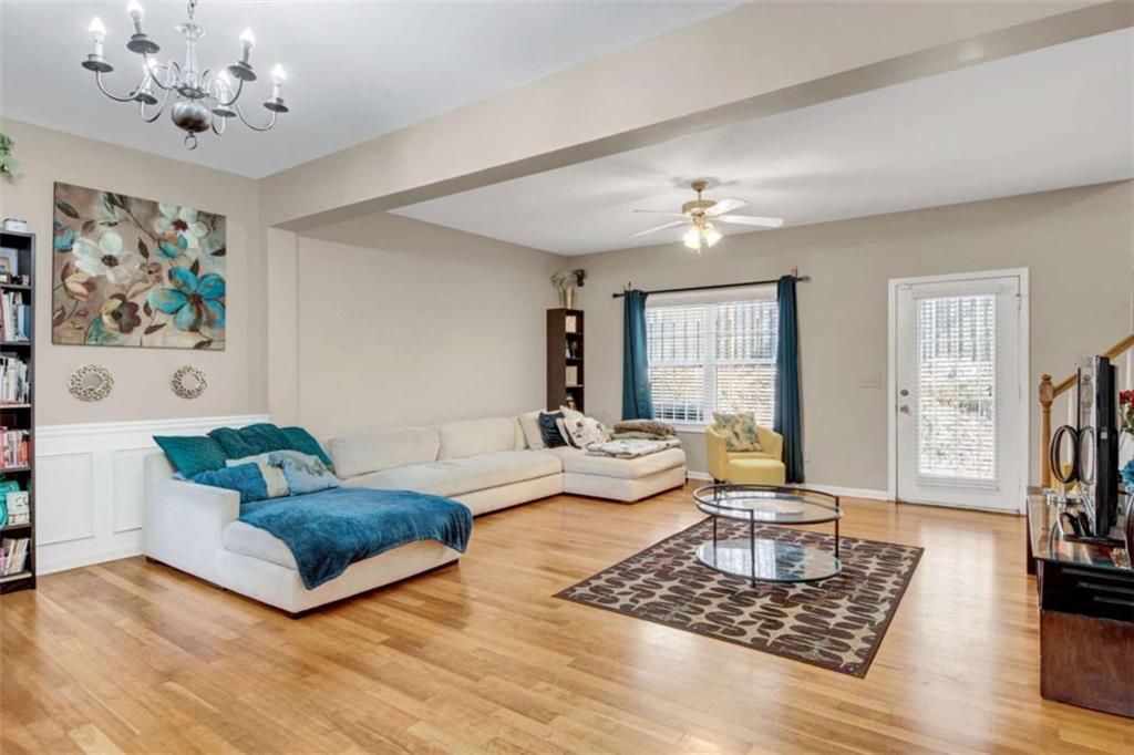 2555 Flat Shoals Road South Fulton, GA 30349 - Photo 5 of 20 a living room with furniture rug and window