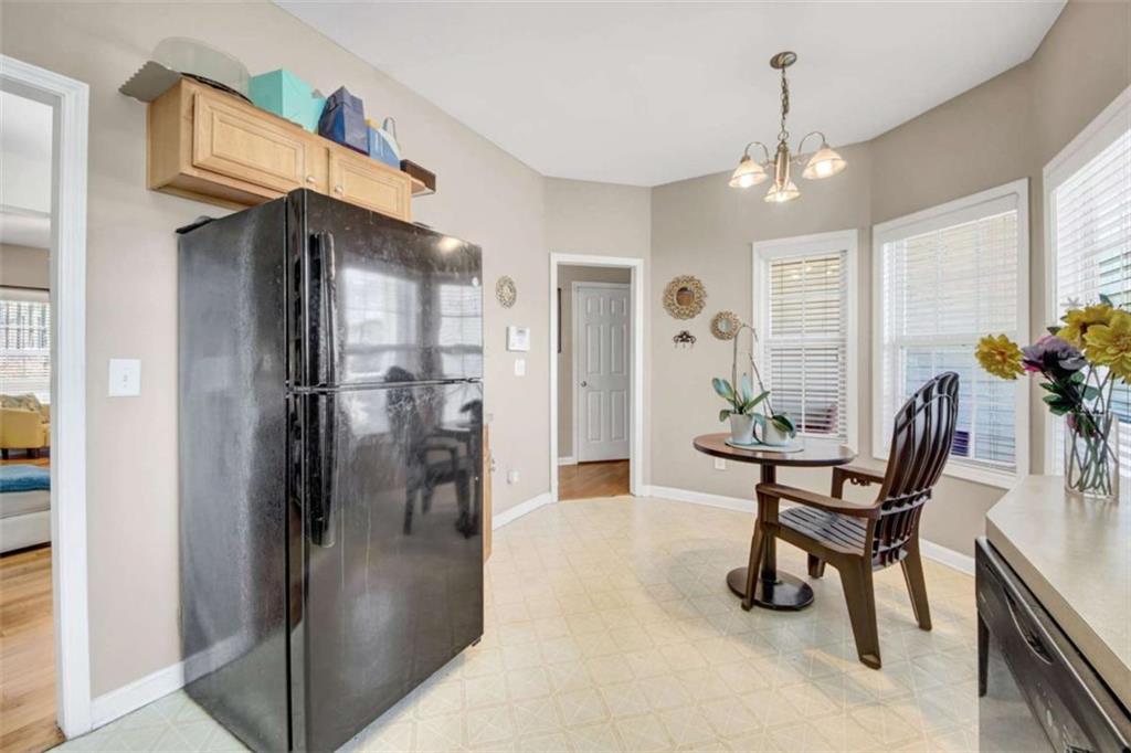 2555 Flat Shoals Road South Fulton, GA 30349 - Photo 10 of 20 a view of a livingroom with furniture and stairs