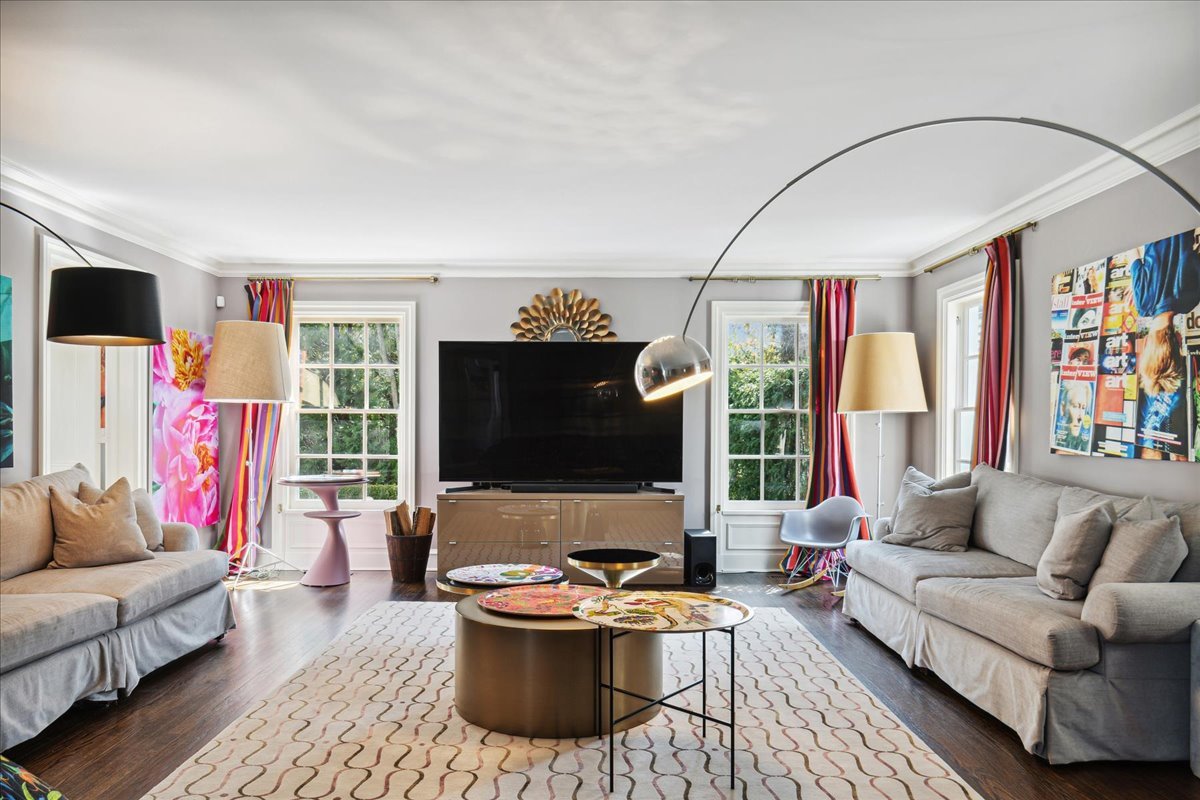 1320 Elm Tree Road Lake Forest, IL 60045 - Photo 11 of 52 a living room with furniture a flat screen tv and a window