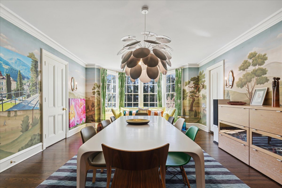 1320 Elm Tree Road Lake Forest, IL 60045 - Photo 15 of 52 a view of a dining room with furniture a chandelier and wooden floor