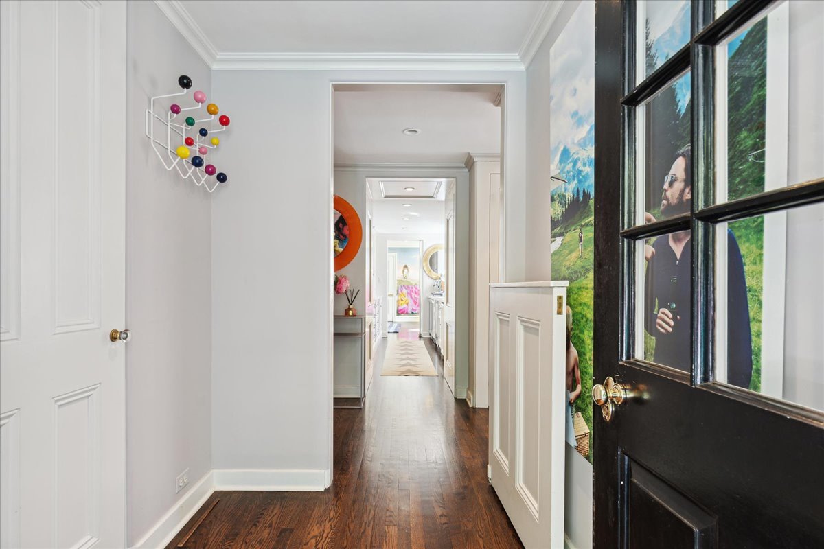 1320 Elm Tree Road Lake Forest, IL 60045 - Photo 19 of 52 a view of a hallway view with wooden floor and windows