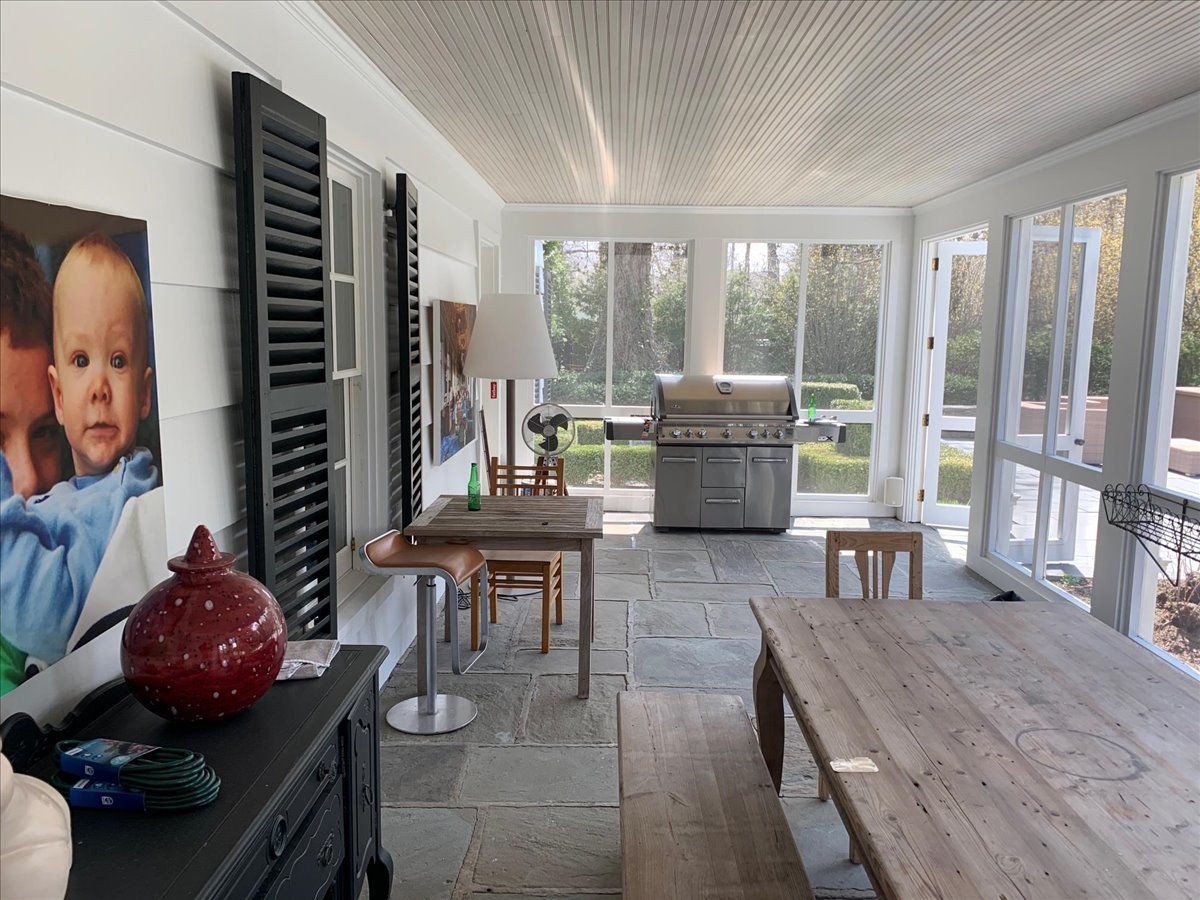 1320 Elm Tree Road Lake Forest, IL 60045 - Photo 25 of 52 a living room with furniture and a floor to ceiling window