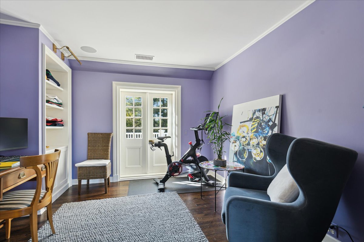1320 Elm Tree Road Lake Forest, IL 60045 - Photo 27 of 52 a living room with furniture potted plant floor and a flat screen tv