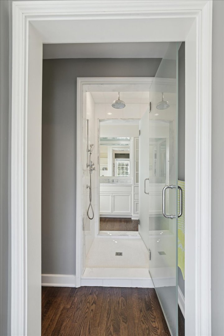 1320 Elm Tree Road Lake Forest, IL 60045 - Photo 33 of 52 a bathroom with a glass shower door