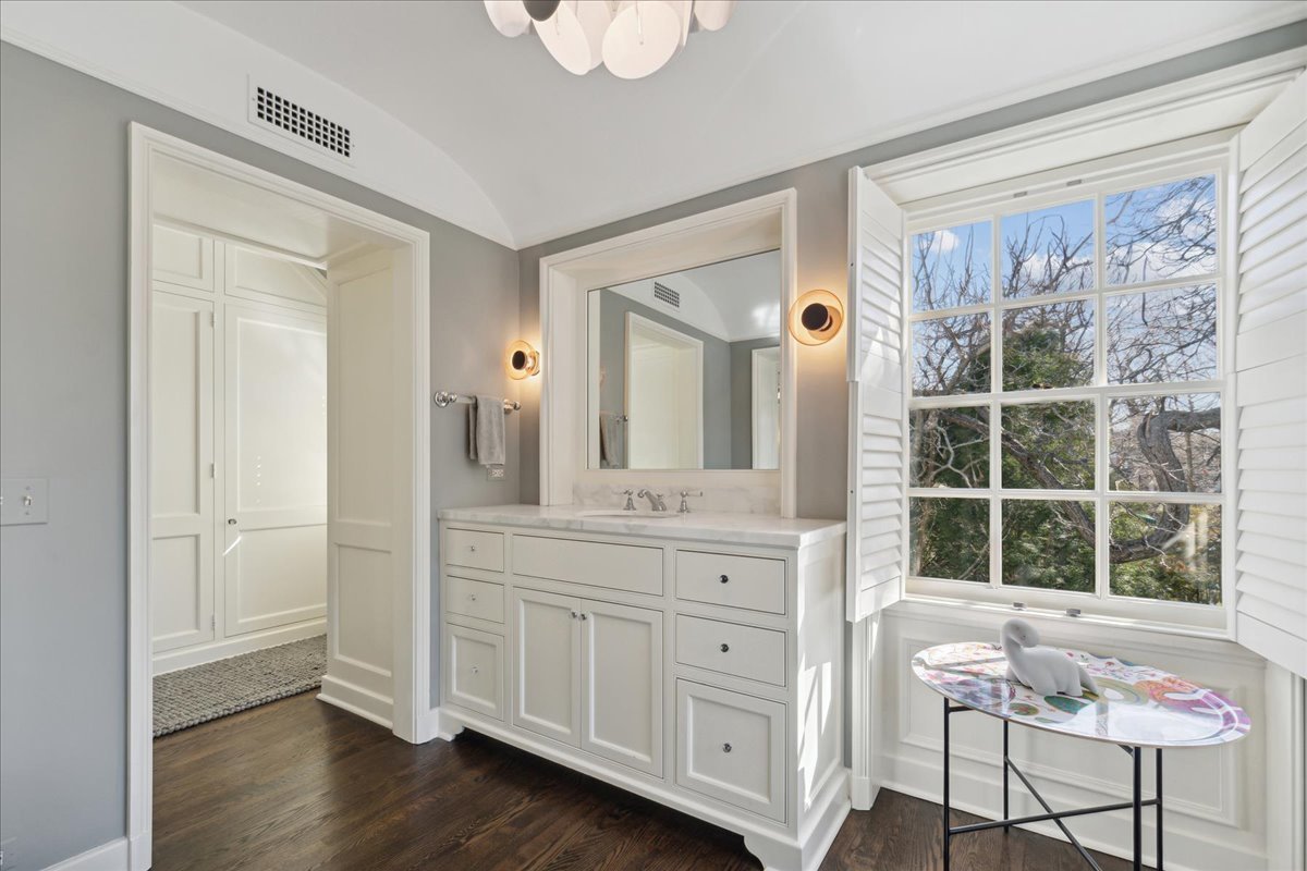 1320 Elm Tree Road Lake Forest, IL 60045 - Photo 34 of 52 a spacious bathroom with a granite countertop sink and a mirror