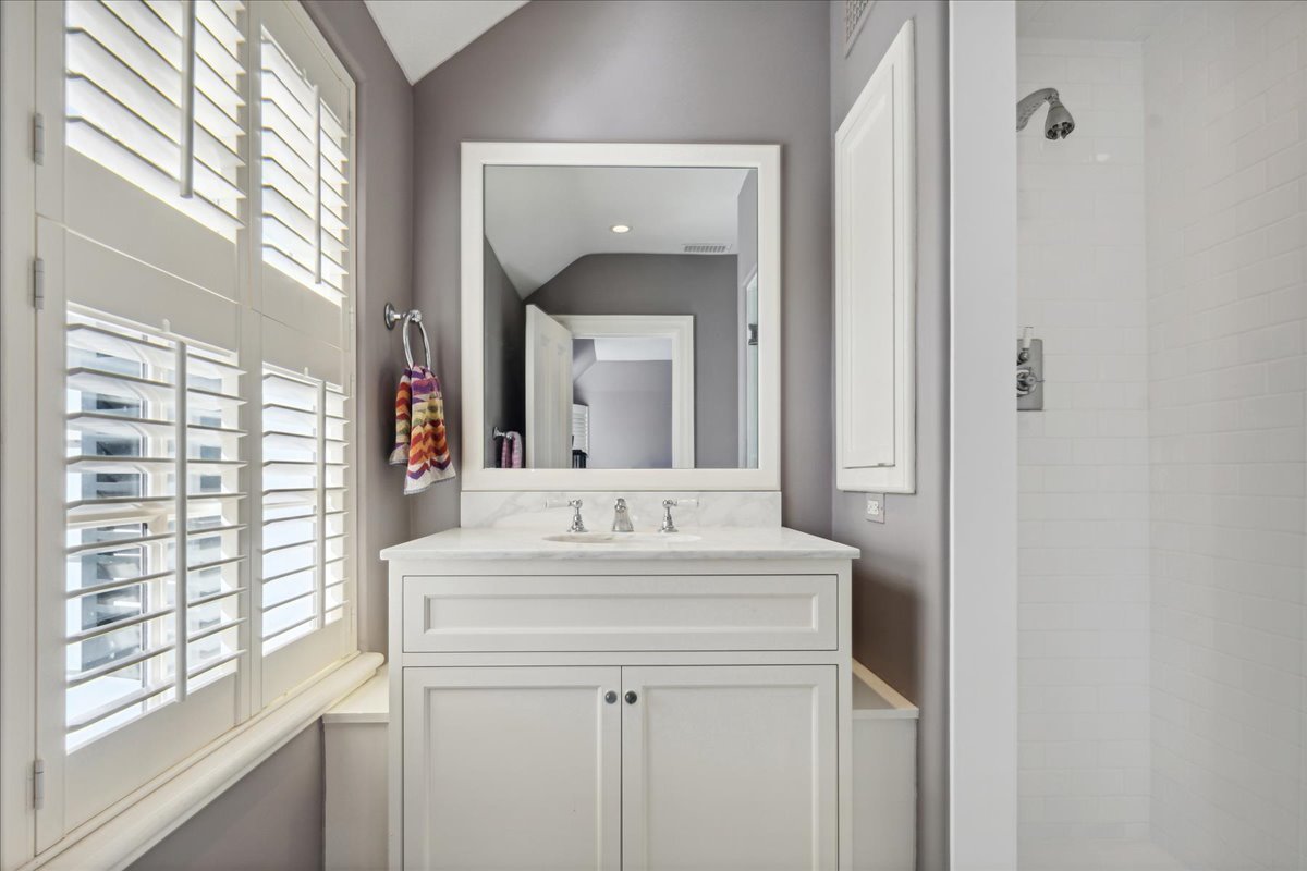 1320 Elm Tree Road Lake Forest, IL 60045 - Photo 41 of 52 a bathroom with a sink and a mirror