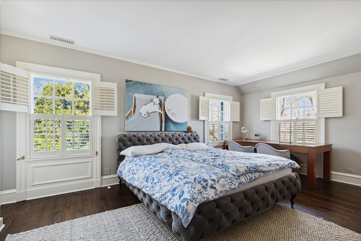 1320 Elm Tree Road Lake Forest, IL 60045 - Photo 42 of 52 a bedroom with a large bed and wooden floor