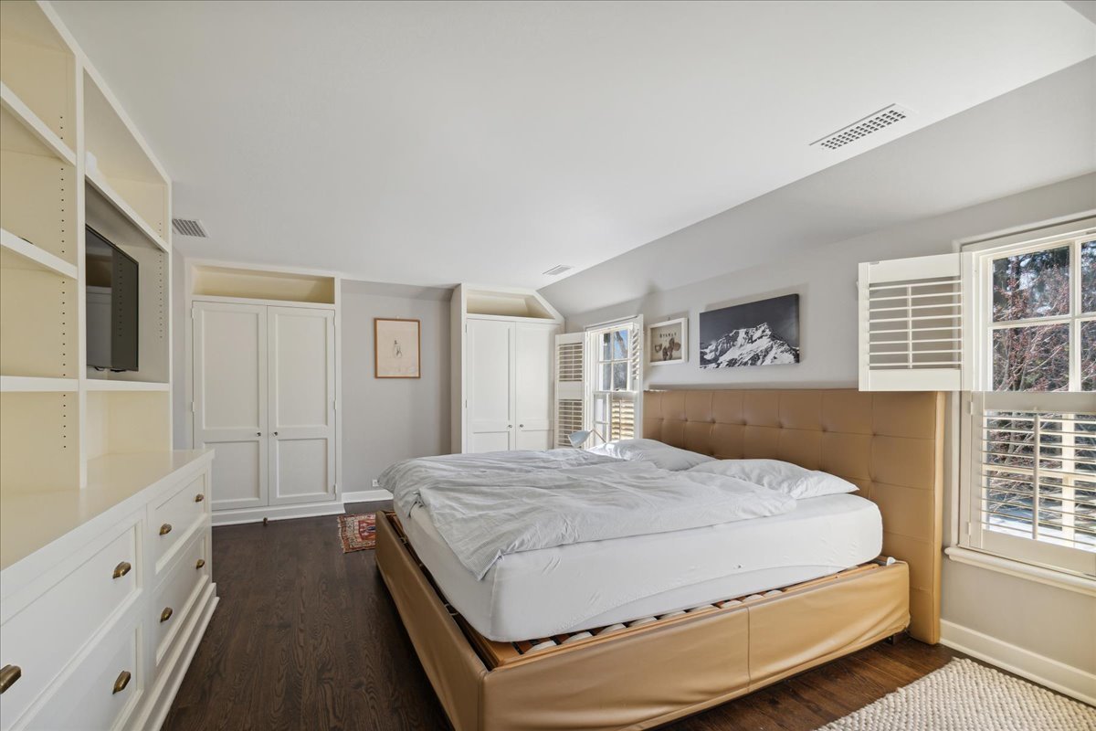 1320 Elm Tree Road Lake Forest, IL 60045 - Photo 46 of 52 a spacious bedroom with a large bed and a window