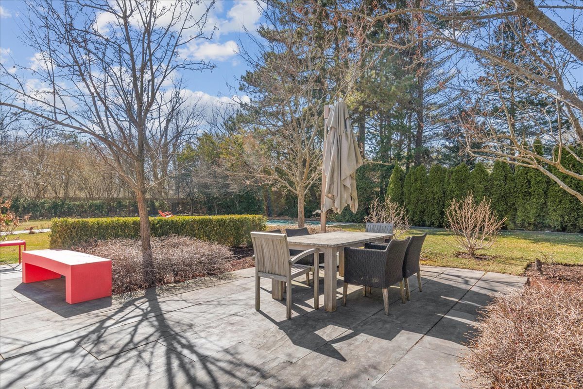 1320 Elm Tree Road Lake Forest, IL 60045 - Photo 49 of 52 a view of a sitting area with furniture and wooden fence