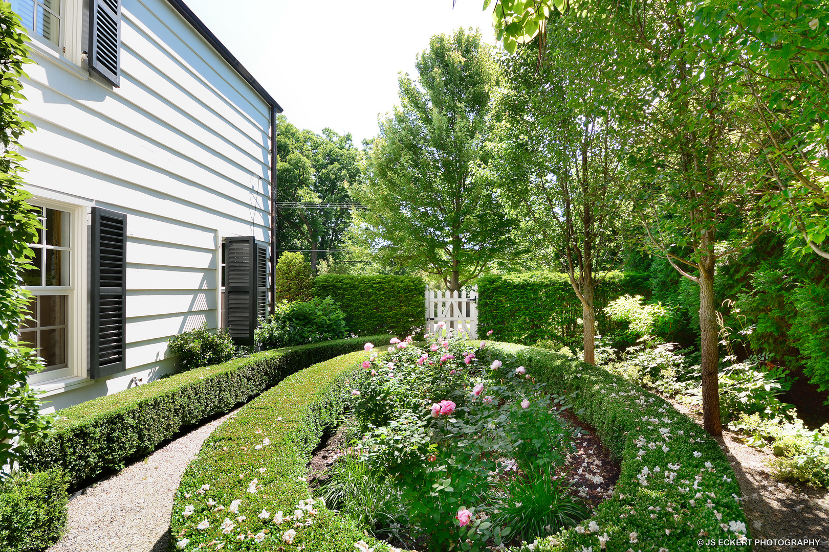 1320 Elm Tree Road Lake Forest, IL 60045 - Photo 7 of 52 a view of a house with a flower garden