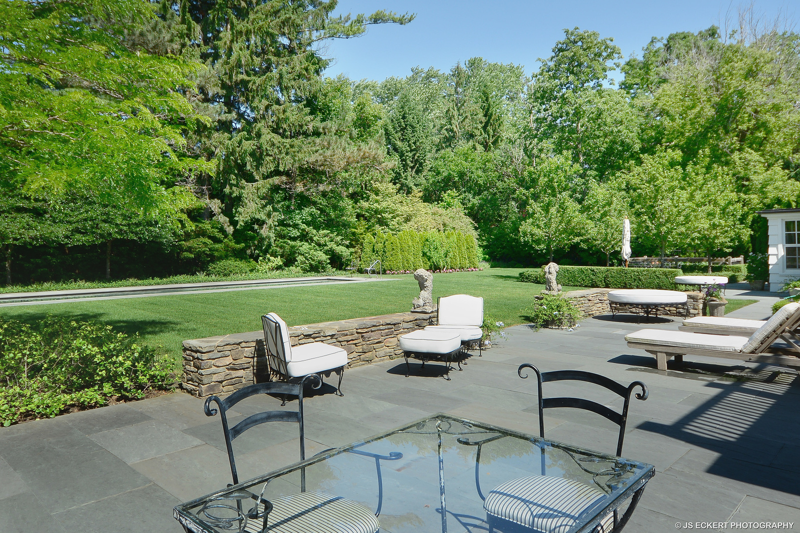 1320 Elm Tree Road Lake Forest, IL 60045 - Photo 9 of 52 a view of a lounge chairs and backyard