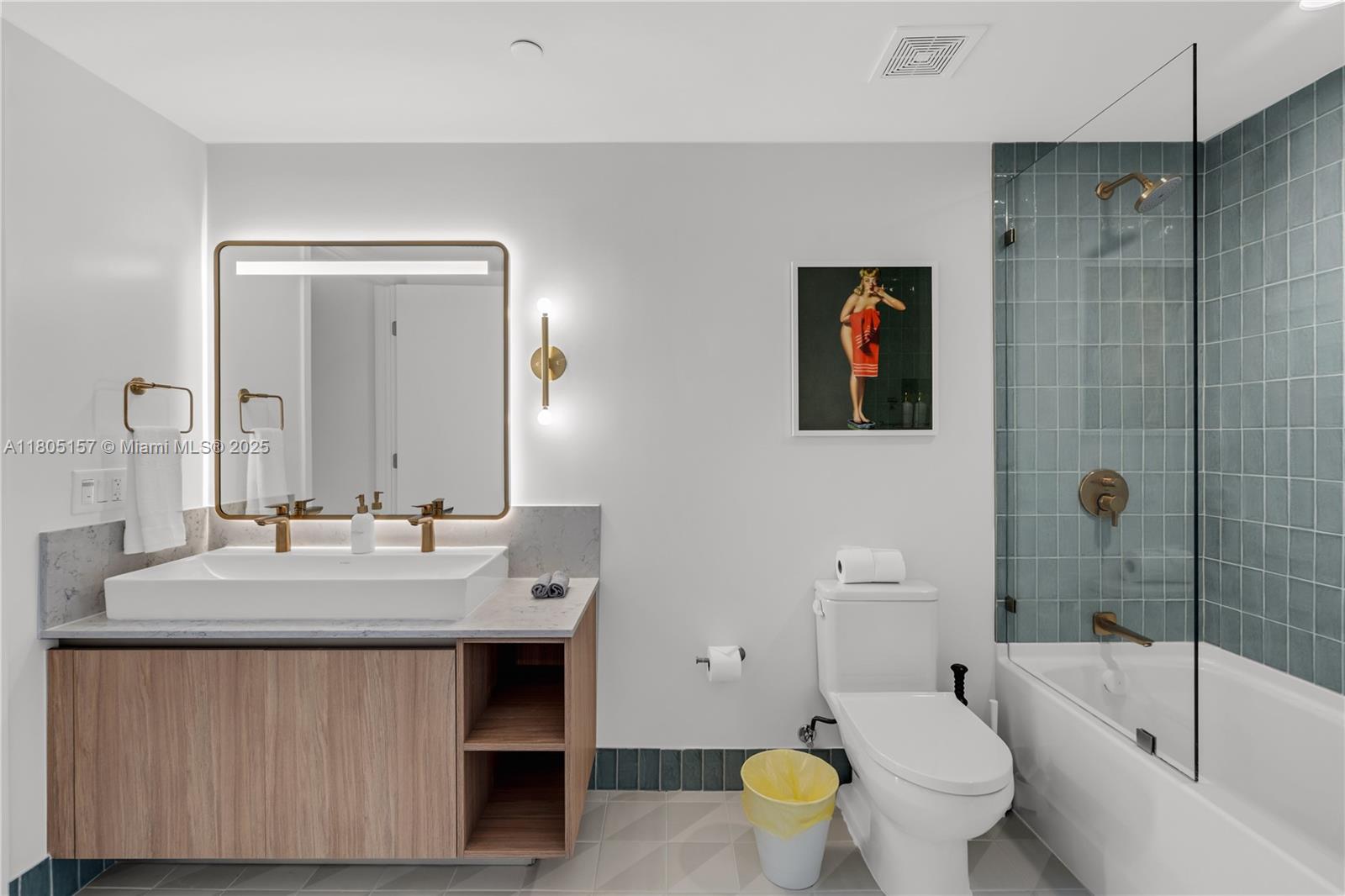 601 Northeast 1st, Unit 4204 Miami, FL 33132 - Photo 15 of 25 a bathroom with a sink a toilet and shower