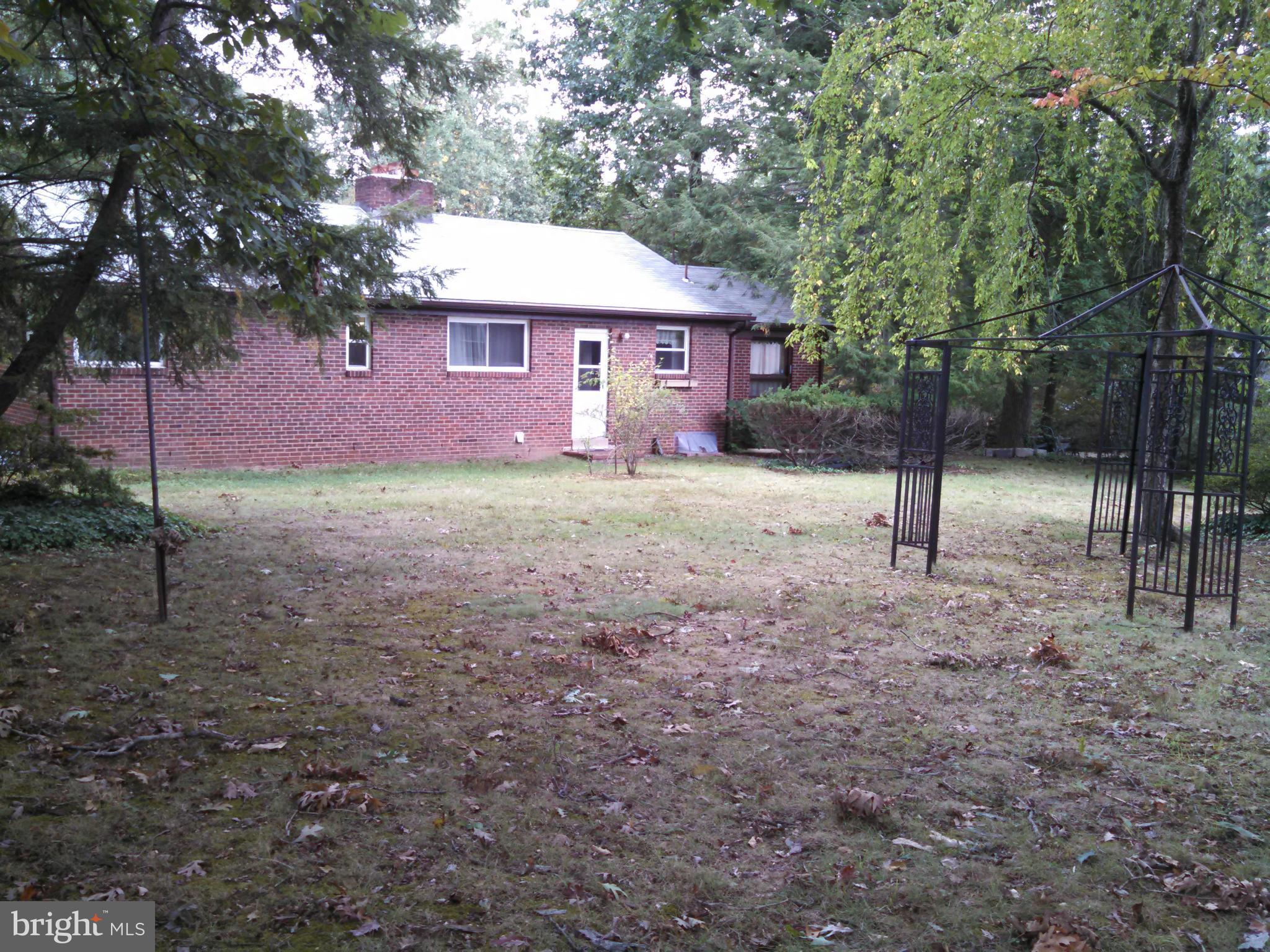 2007 Pagebrook Road Silver Spring, MD 20903 - Photo 22 of 24 a view of a house with a yard and tree s