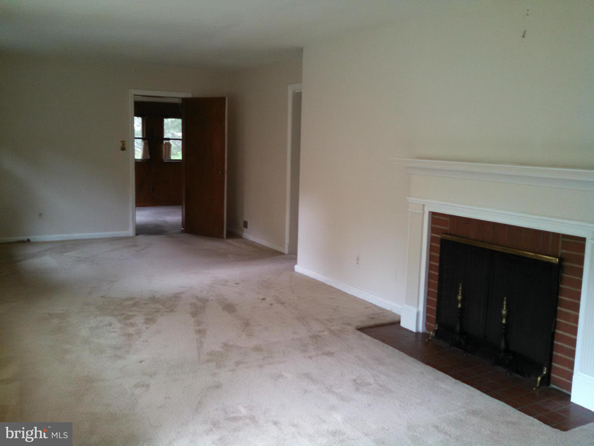 2007 Pagebrook Road Silver Spring, MD 20903 - Photo 4 of 24 a view of an empty room and fire place