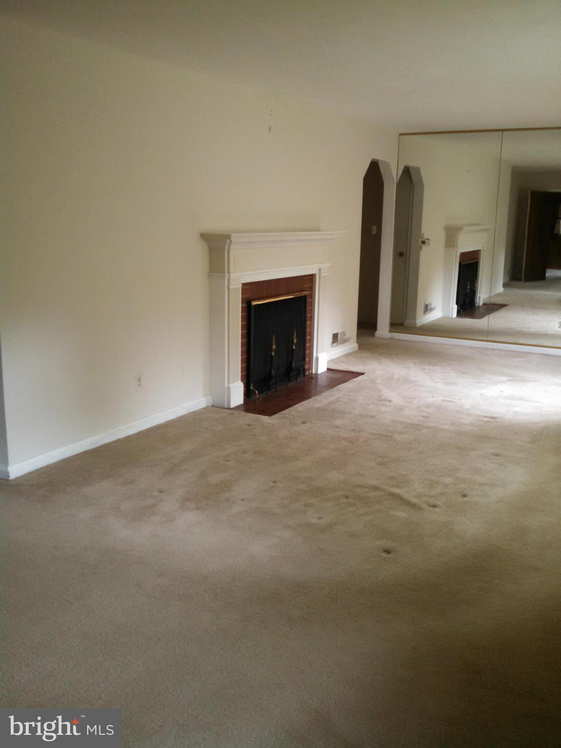 2007 Pagebrook Road Silver Spring, MD 20903 - Photo 6 of 24 a view of an empty room with a fireplace