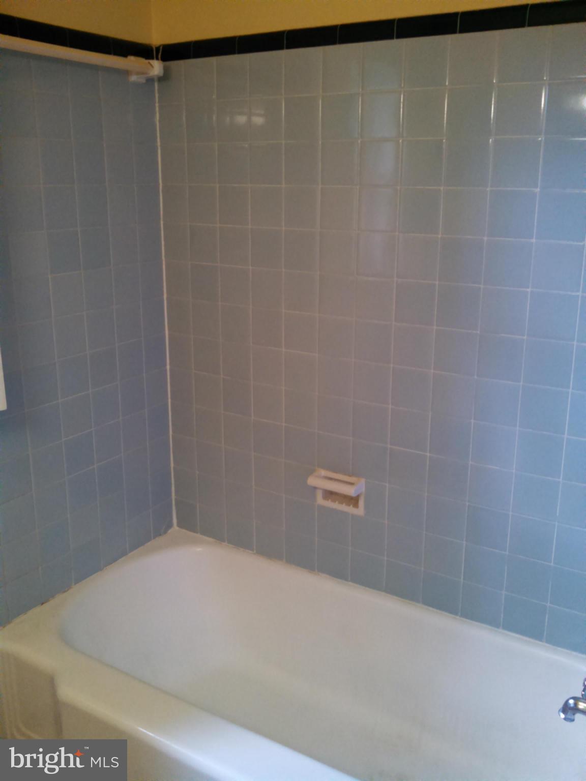 2007 Pagebrook Road Silver Spring, MD 20903 - Photo 9 of 24 a bathroom with a shower curtain