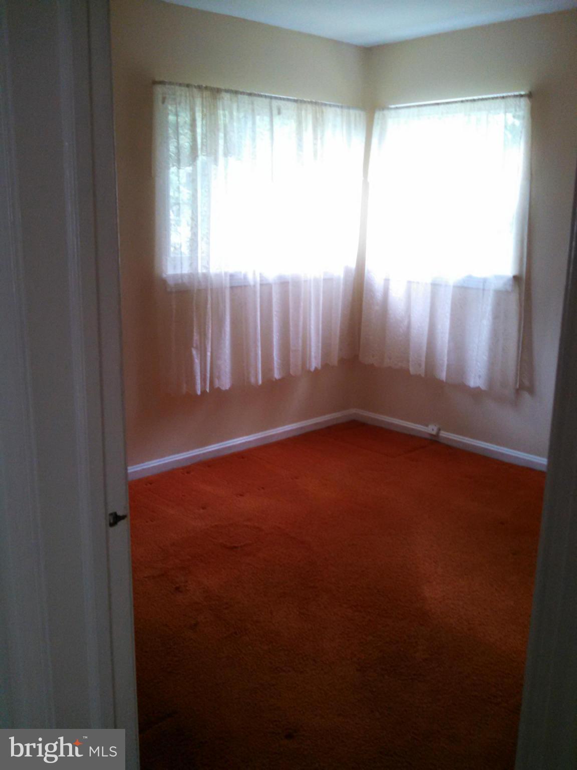 2007 Pagebrook Road Silver Spring, MD 20903 - Photo 10 of 24 a view of an empty room with a window